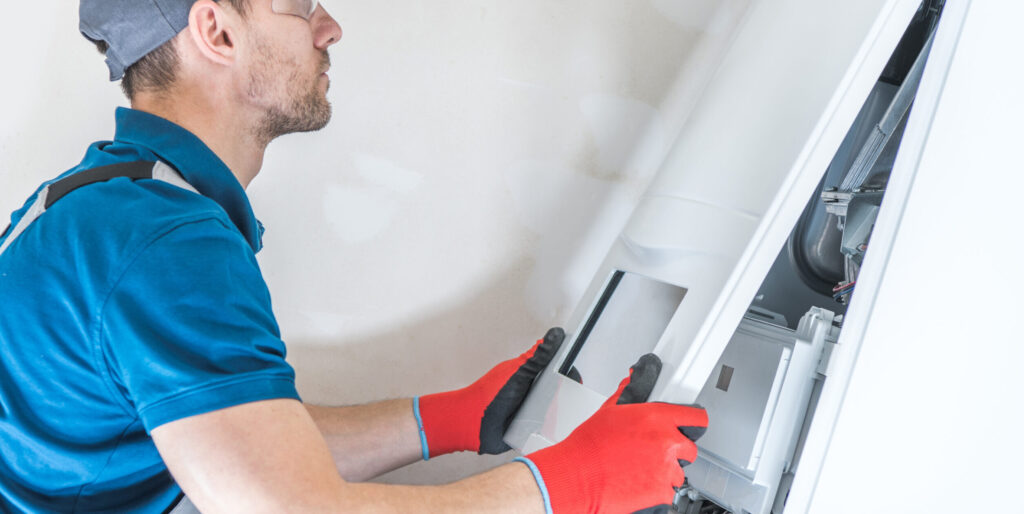 boiler repair person on an emergency boiler service call