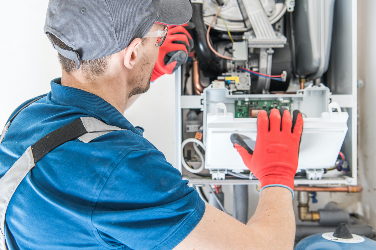 boiler repair person on an emergency boiler service call