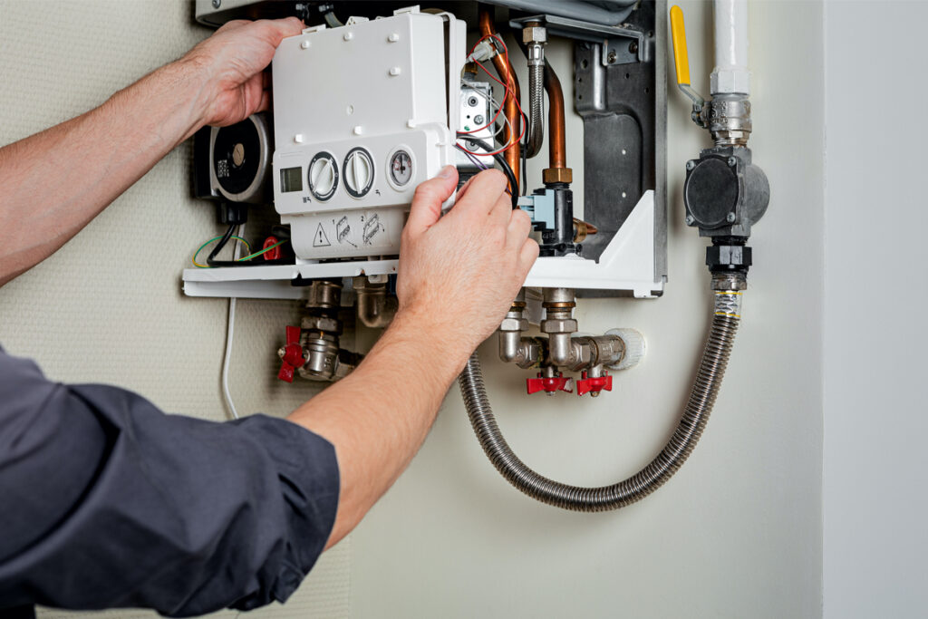 boiler repair person on an emergency boiler service call